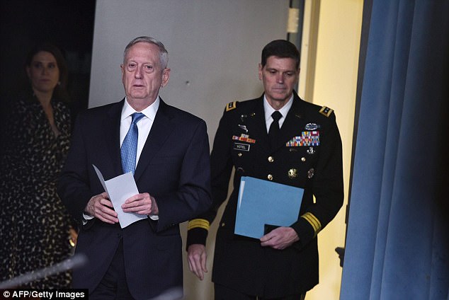 Secretary of Defense James Mattis (left) told reporters that in the Nazi World War II era, chemical weapons weren't used 'on battlefields'