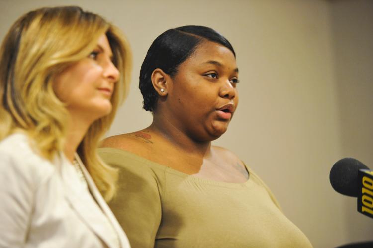 Quantasia Sharpton (r.) and her lawyer Lisa Bloom hold a press conference at the Hilton Hotel on Monday. Sharpton claims she contracted herpes from Usher. 