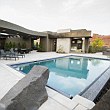 Modern luxury home facing swimming pool